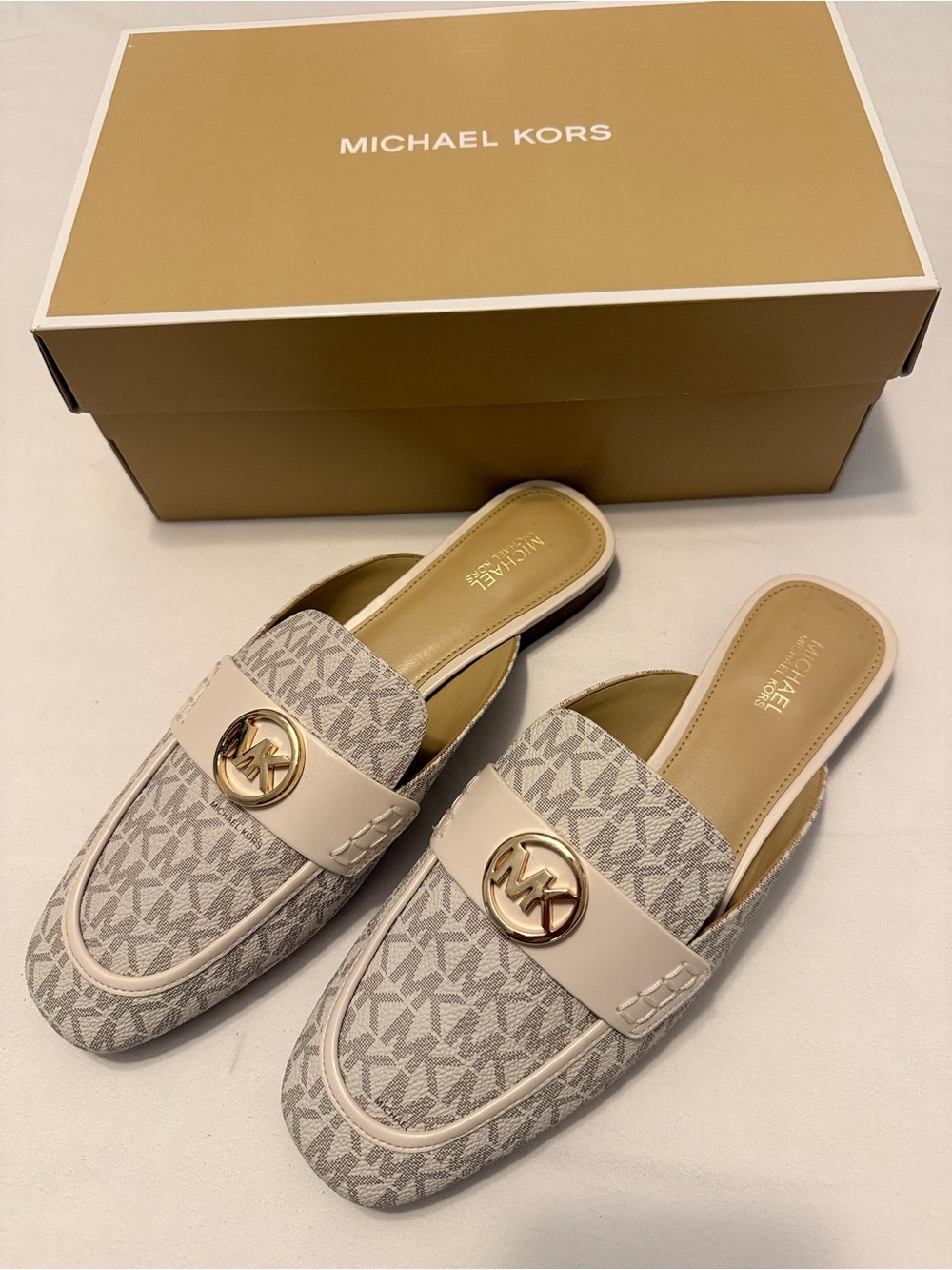 Michael Kors Beige Logo Slip-On Mules with Gold MK Medallion